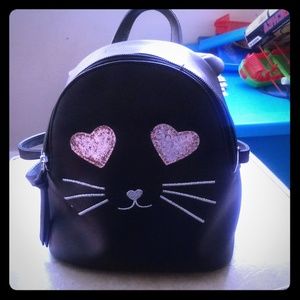 Today I am selling a (Mini Kitty Backpack/ purse)